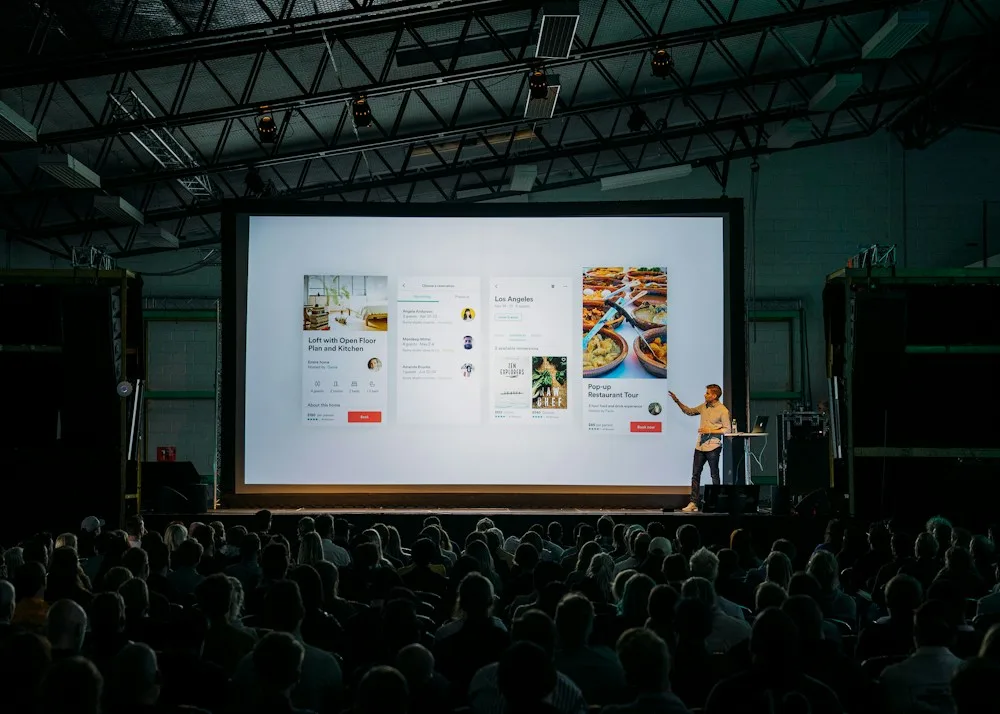 A speaker presenting at a company event